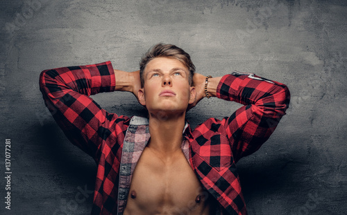 Athletic male in a red flee...