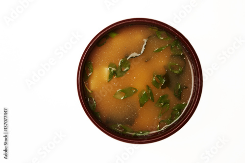 Asian soup in a cup isolated on white background.