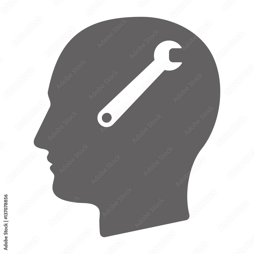 Isolated male head with a spanner Isolated male head with a spanner