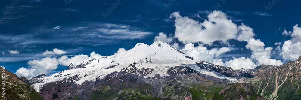 Panorama view of Mt. Elbrus from Cheget slope in summer sunny day