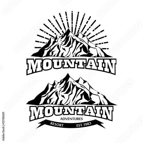 set of vector icon of mountain for logo for mountain adventure with sunburst on the background and with ribbon