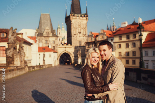 Photography young and happy woman and man standing together outdoors