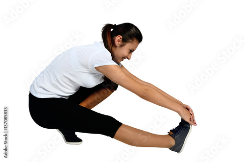 isolated young woman doing exercise