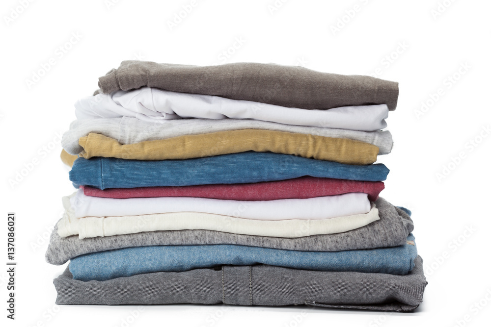 Stack of clothes on white background, closeup Stack of clothes on white background, closeup