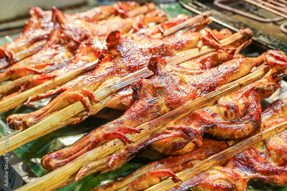Delicious spicy grilled chicken meat on sticks, Thai food