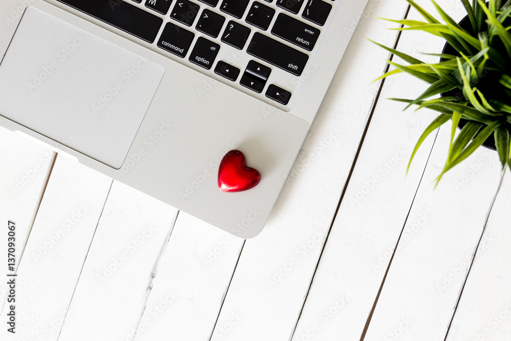 Red Heart on laptop and white wooden background, Love concept Red Heart on laptop and white wooden background, Love concept