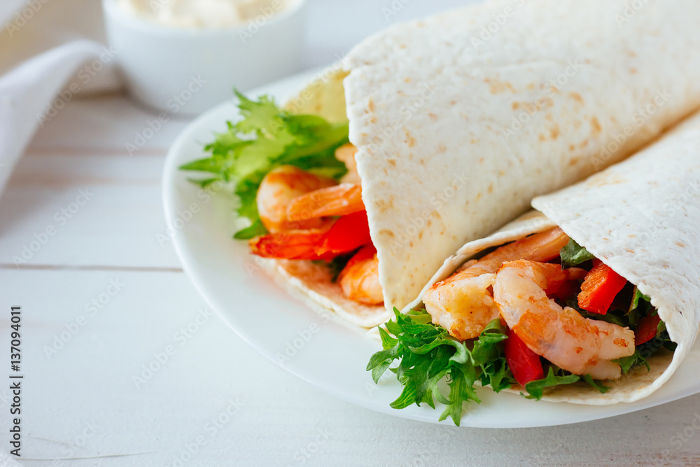 Tortilla with shrimps and salad Tortilla with shrimps and salad