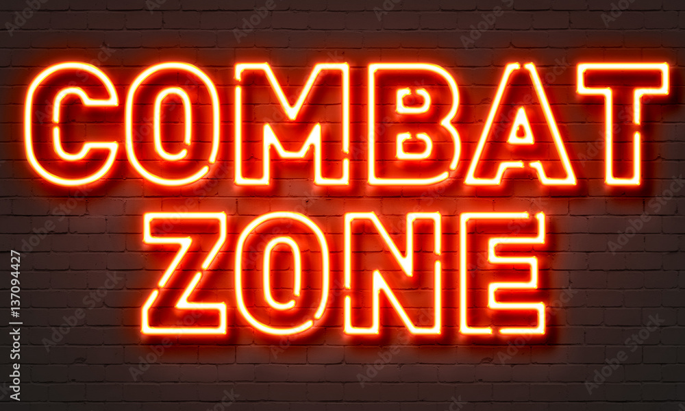 Combat zone neon sign on brick wall background.