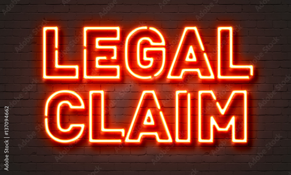 Legal claim neon sign on brick wall background. Legal claim neon sign on brick wall background.