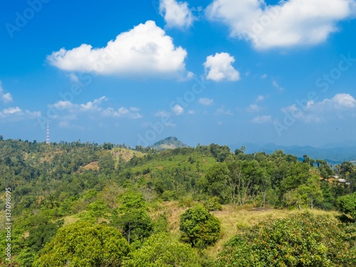Beautiful Mountain view landscape over greenery with Blue sky and white clouds in Nelligala Kandy, Sri Lanka © Sisitha
