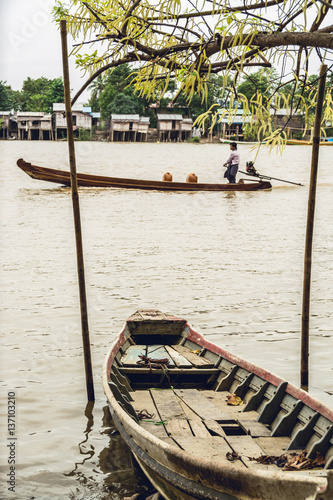 Boat, fishing village and willow tree flowers in Myanmar, Irrawaddy delta - 2 photo