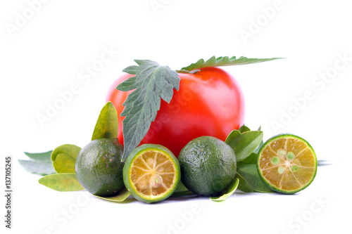 фотографія Tomatoes and Calamondin isolated on white