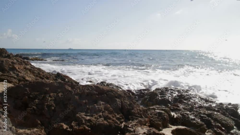 Waves crashing on the rocks at Sunset Beach in Saint Martin. Waves crashing on the rocks at Sunset Beach in Saint Martin.