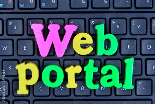 Web portal words on computer keyboard