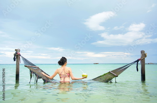 Woman enjoying horizon view with tropical