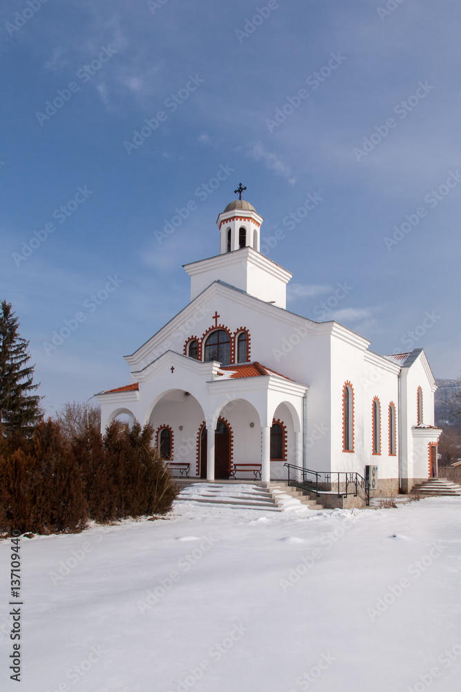 Small white church on sunny winter day. Small white church on sunny winter day.
