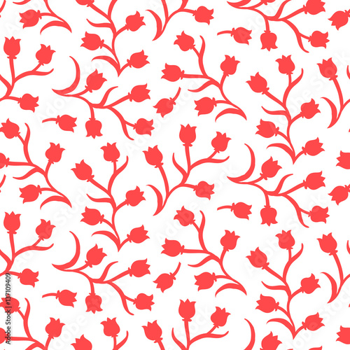 Ditsy floral pattern with small red tulips