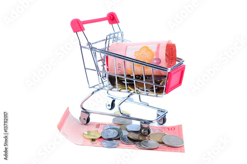 The concept of financial planning, Many of Malaysian coins in the troley isolate on white