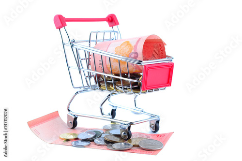 The concept of financial planning, Many of Malaysian coins in the troley isolate on white