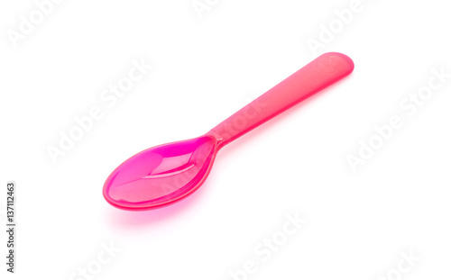 red plastic spoon
