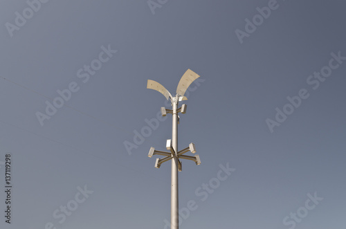 Silhouette of a street lamp at day