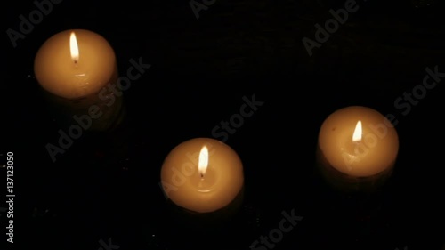 Wallpaper Mural Group of candles flickering in the dark. Torontodigital.ca