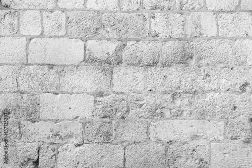 Old, aged and dirty brick wall texture in black&white.