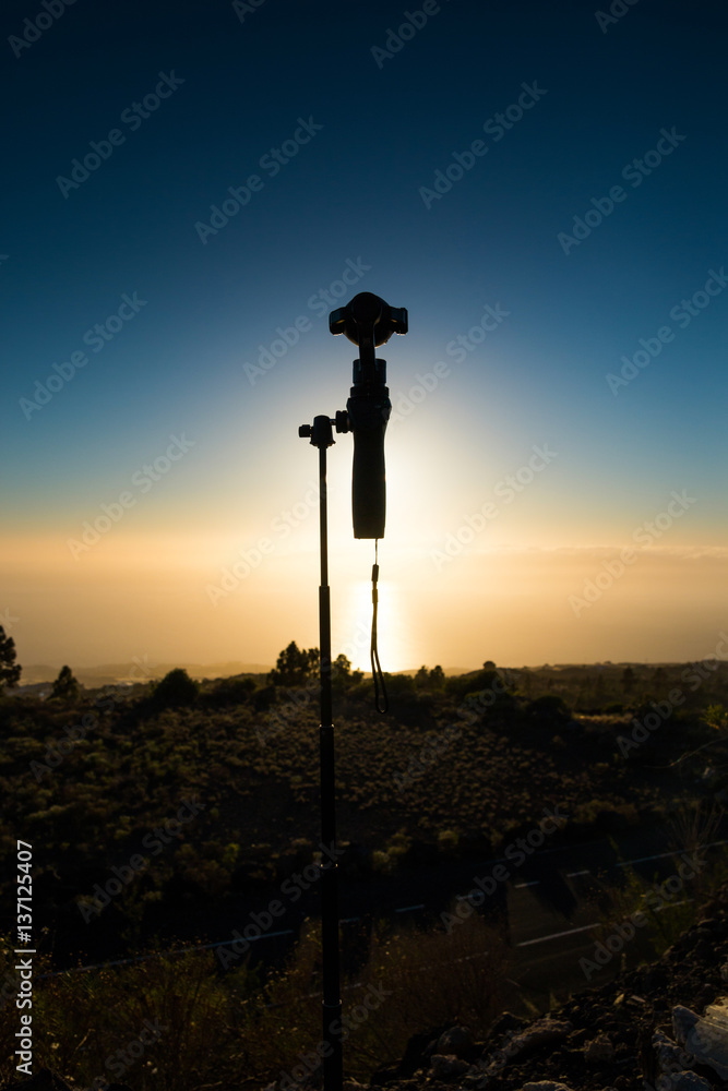 Silhouette of Camera on sunset background Silhouette of Camera on sunset background