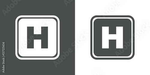 Icono plano simbolo hospital gris y blanco