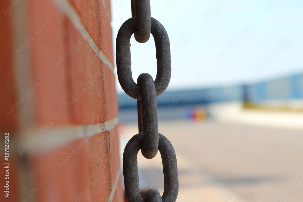 Chain next to a wall Chain next to a wall