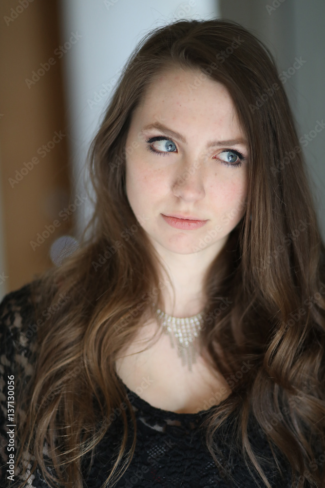 Woman with Brown Hair and Beautiful Blue Eyes