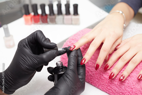 Woman having a manicure in a beauty salon