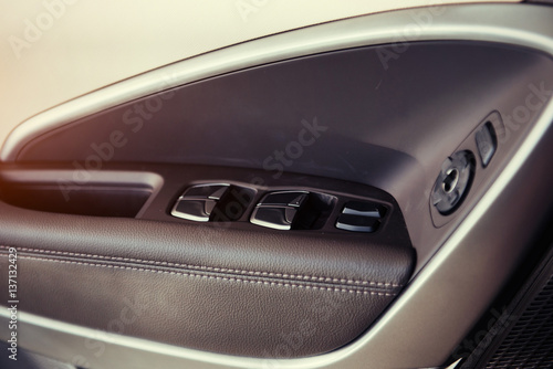 Modern car interior dashboard and steering wheel © standret