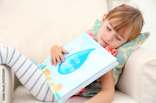 Little cute girl sleeping w...