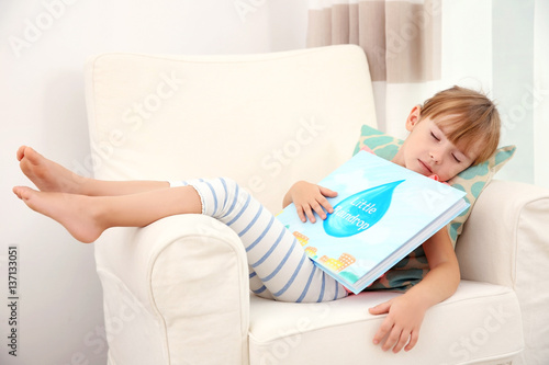 Little cute girl sleeping w...