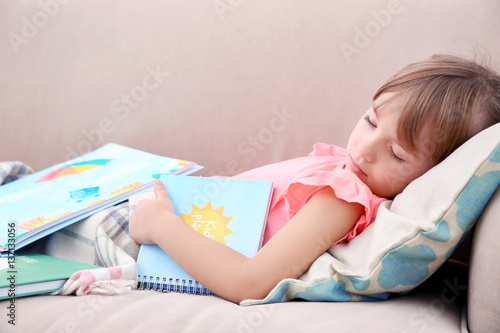 Little cute girl sleeping w...