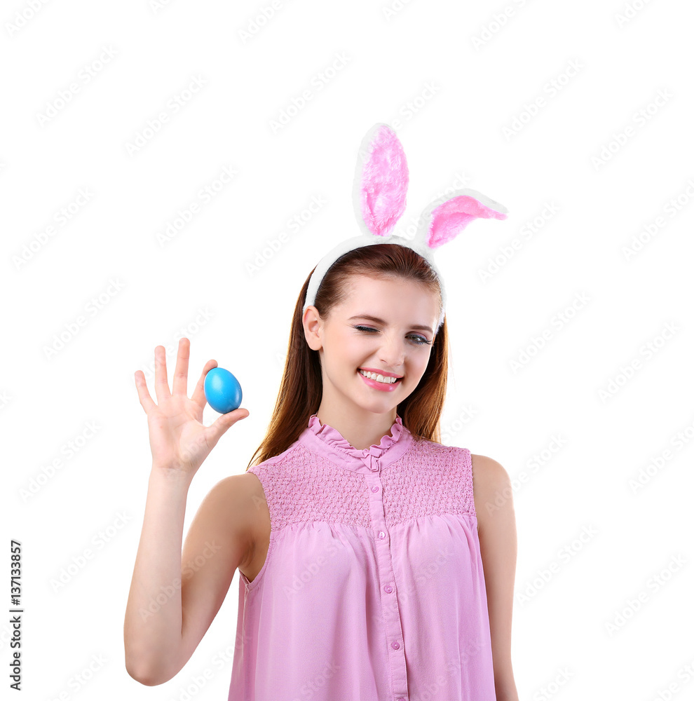 Beautiful girl with bunny ears and Easter egg on white background Beautiful girl with bunny ears and Easter egg on white background