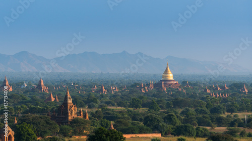 Golden pagoda among pagoda field in Bagan, Myanmar