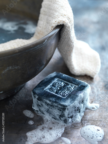Black soap, lather and cloth 