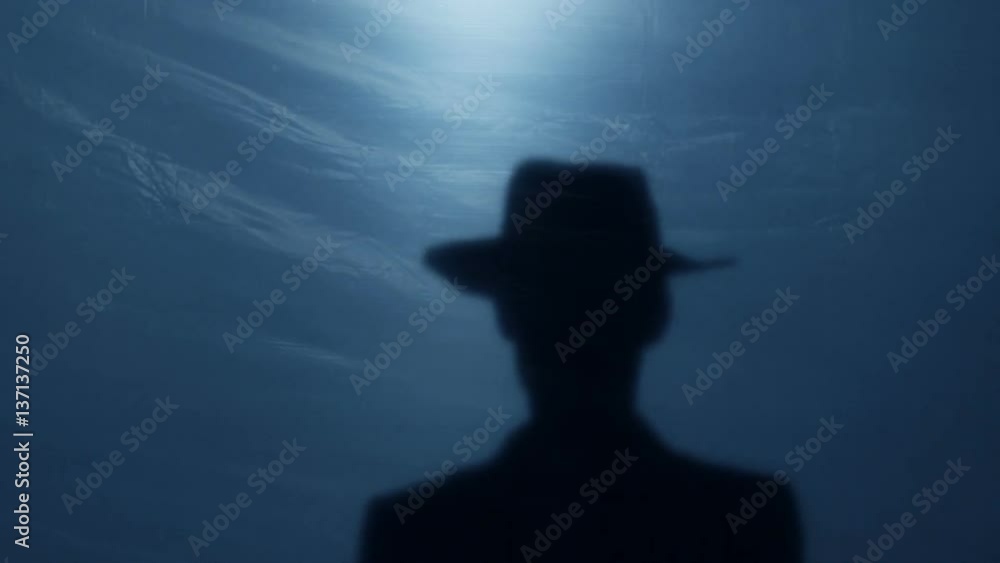 Psycho maniac taking hat off, threatening victim with sharp axe, crazy murderer Psycho maniac taking hat off, threatening victim with sharp axe, crazy murderer