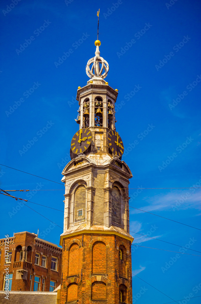 Munttoren clock tower to the rear at Muntplein, Amsterdam,  Netherlands,
