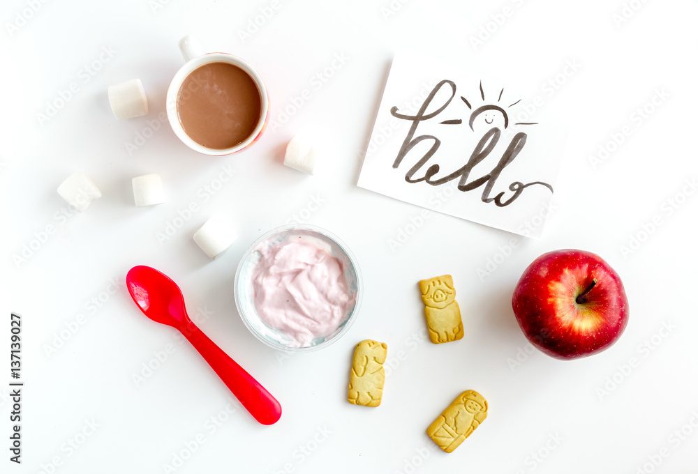 concept kid breakfast with yogurt top view white background concept kid breakfast with yogurt top view white background