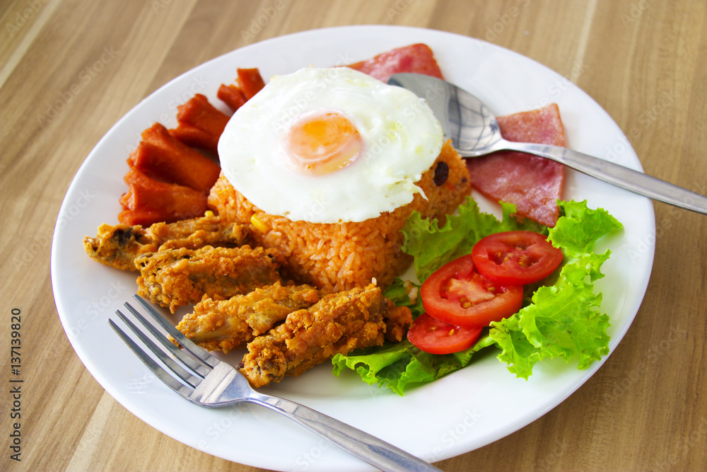 American fried rice with sausage and salad American fried rice with sausage and salad
