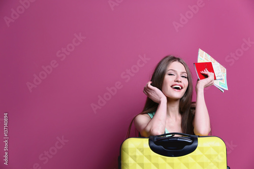 Female traveler with map, p...