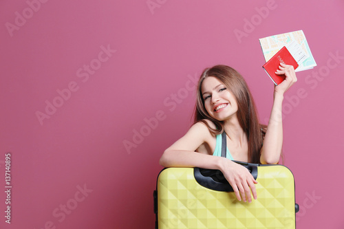 Female traveler with map, p...