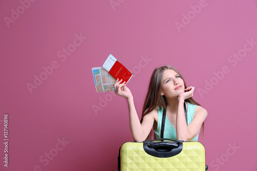 Female traveler with map, p...