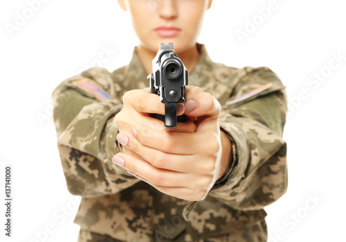Pretty female soldier with pistol on white background, closeup
