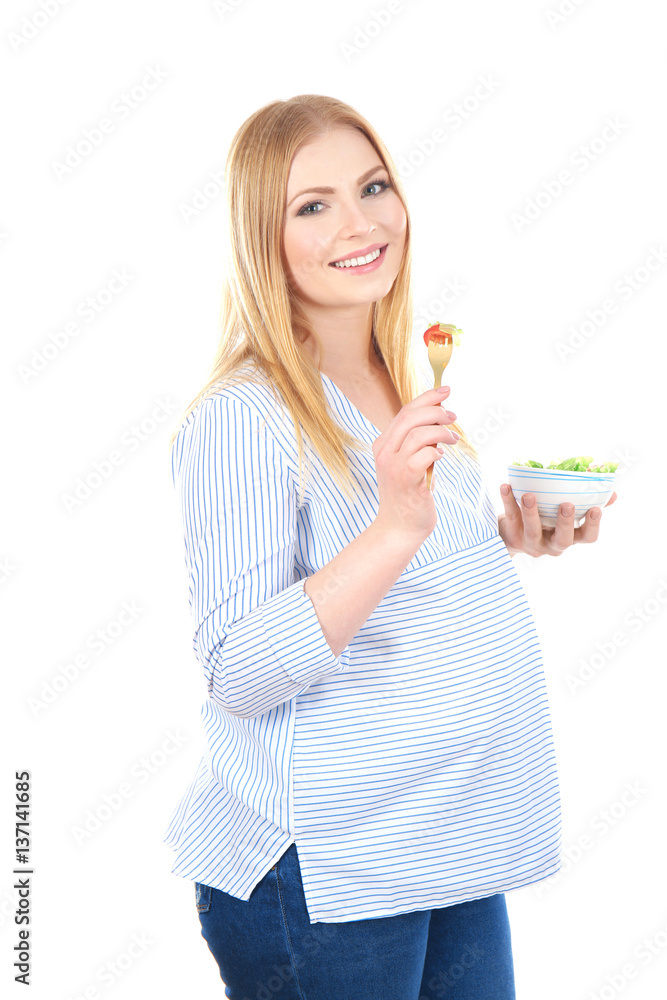 Pregnant young woman with food on white background Pregnant young woman with food on white background