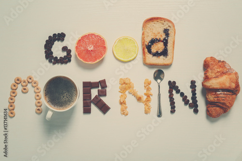 Schilderij op canvas Phrase GOOD MORNING made of breakfast products on light background