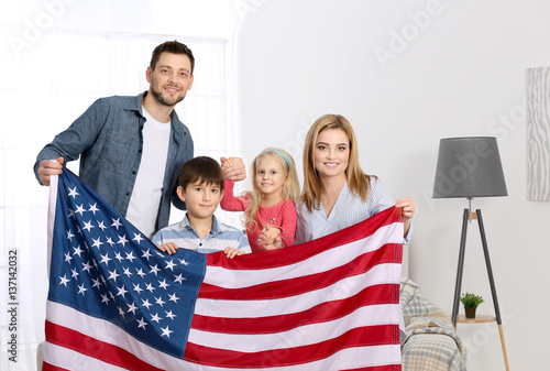 Happy family with American ...